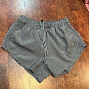 size xs nike dri fit grey running shorts with mesh detail